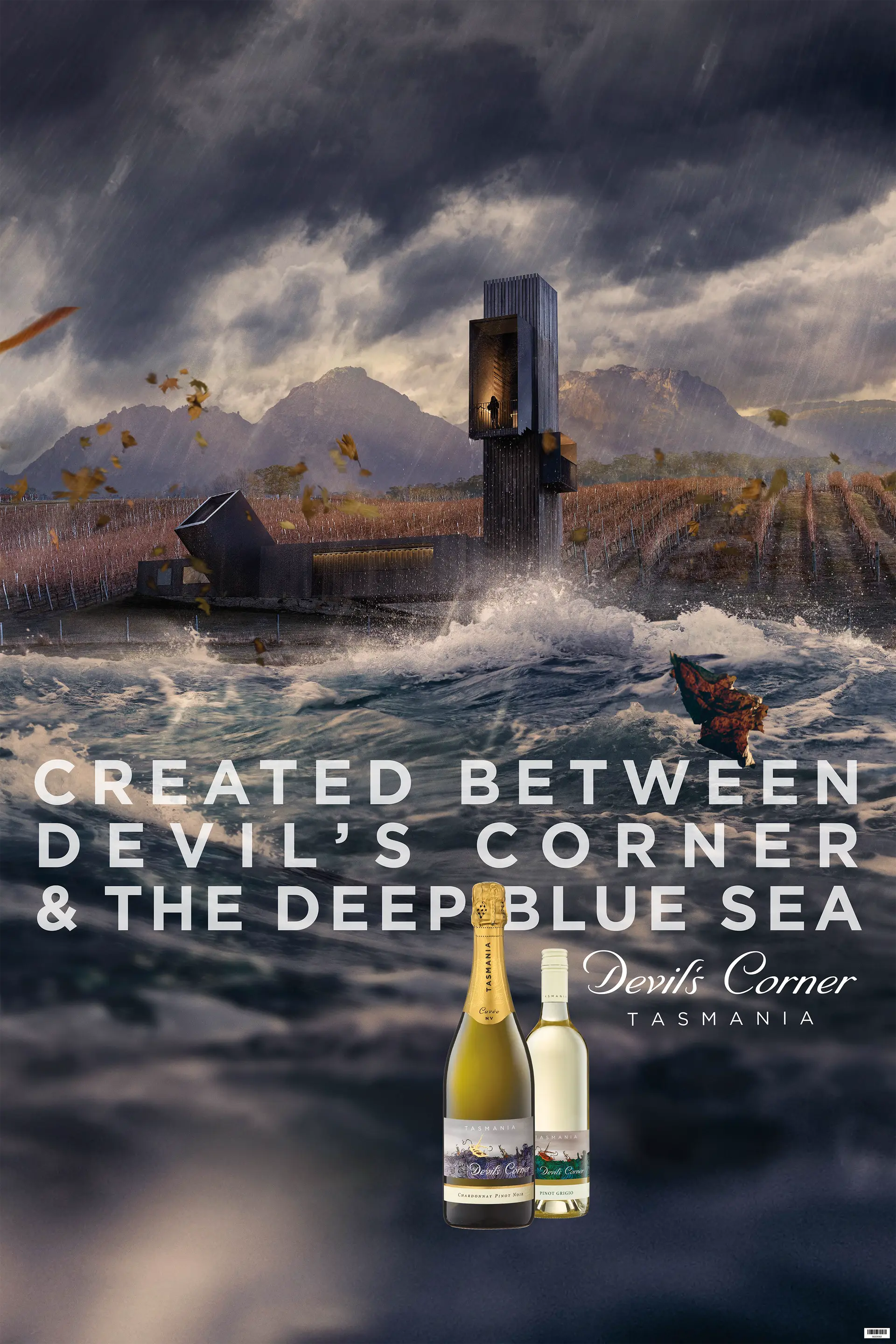 Dramatic advertisement showing the Devil’s Corner vineyard lookout as a tall, lighthouse-like structure amid stormy seas and rain, with waves crashing in the foreground and vineyards and mountains behind, alongside the text “Created between Devil’s Corner & the deep blue sea” and wine bottles.