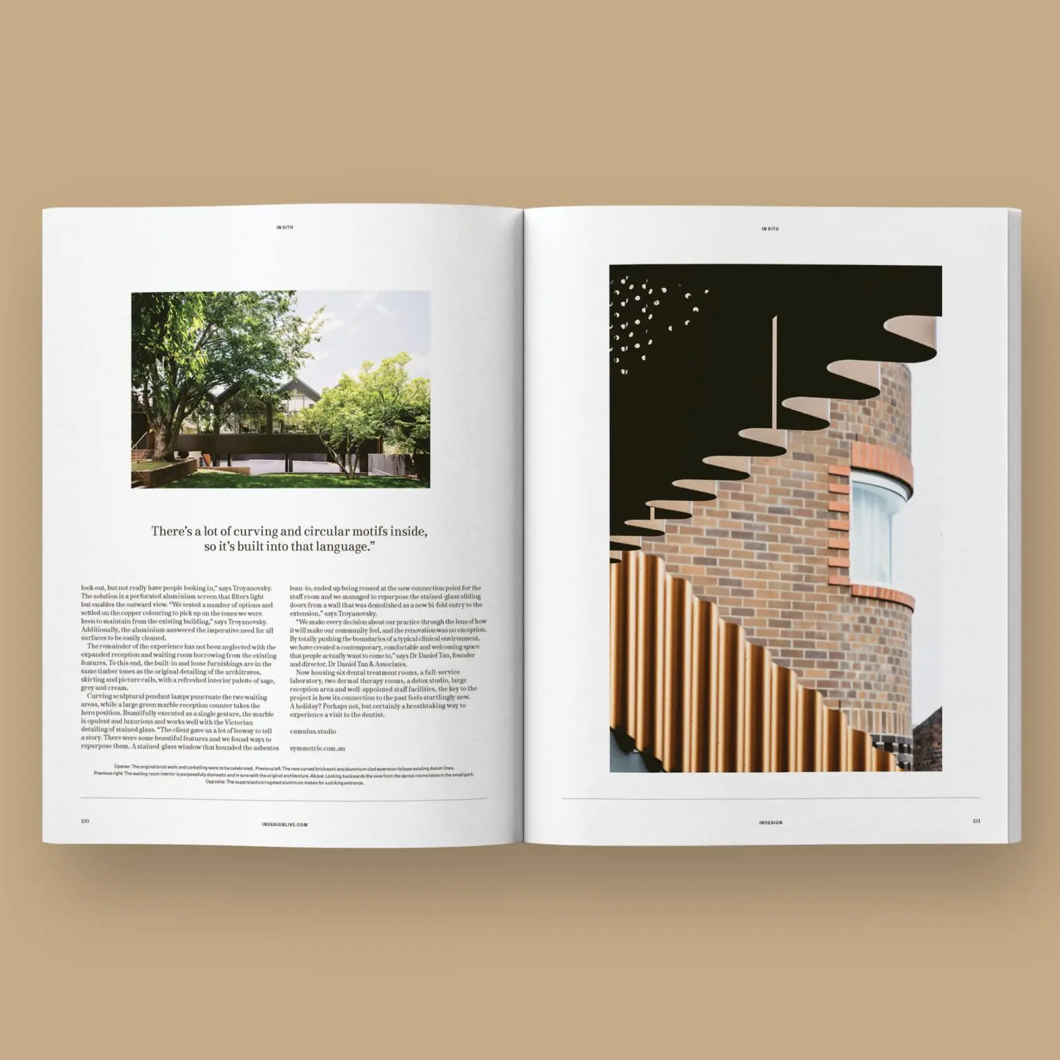 An open magazine spread from INDESIGN showing architectural details from Dr Daniel Tan dental practice.