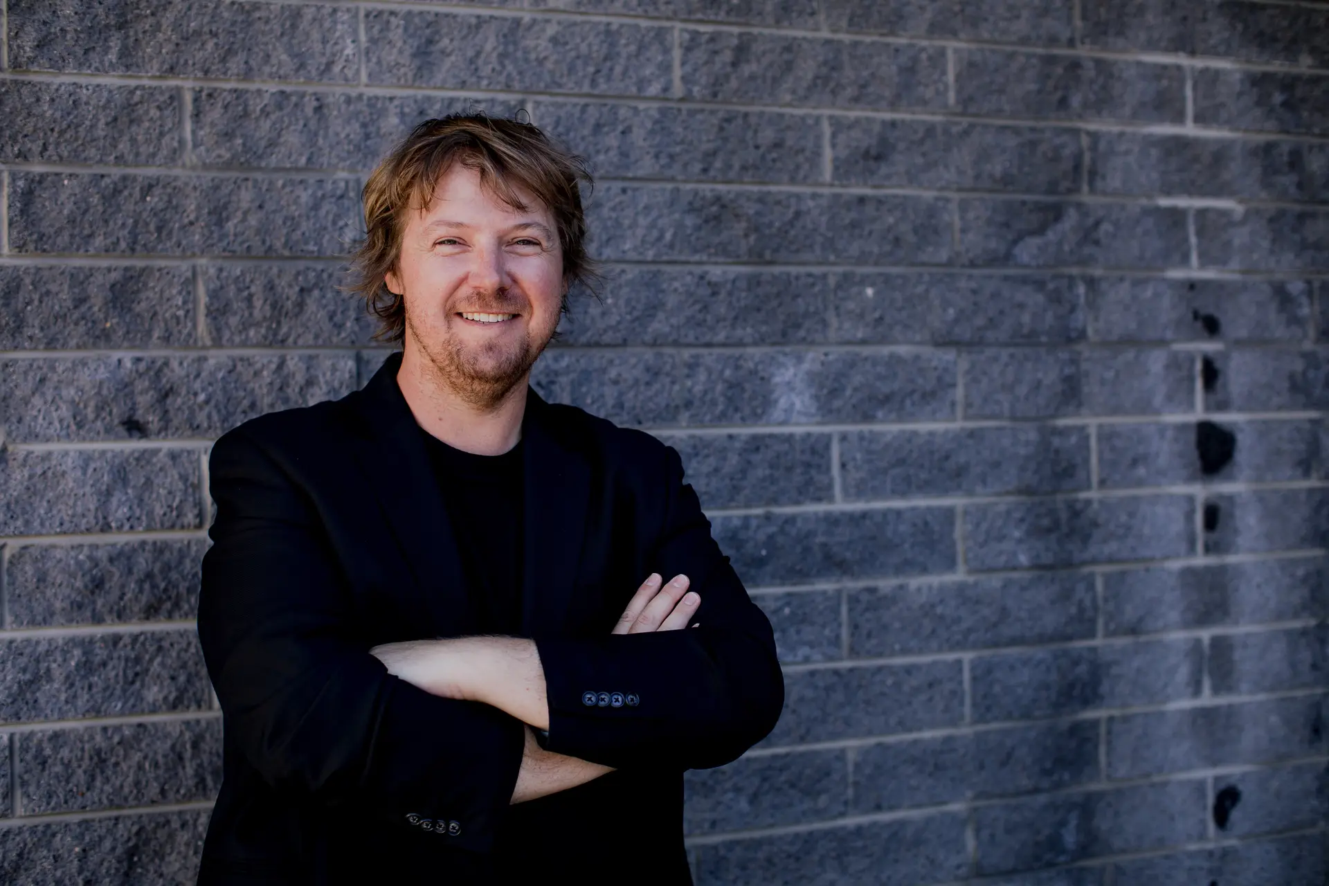 A portrait image of Peter Walker smiling.