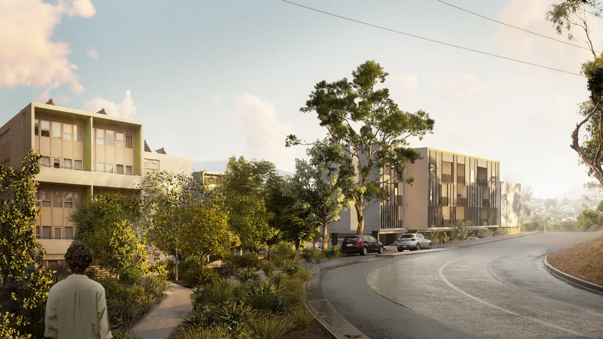 rendering of the Queens Walk apartments in Hobart integrated into a sloping streetscape with native gardens and pedestrian paths that wind through established trees.