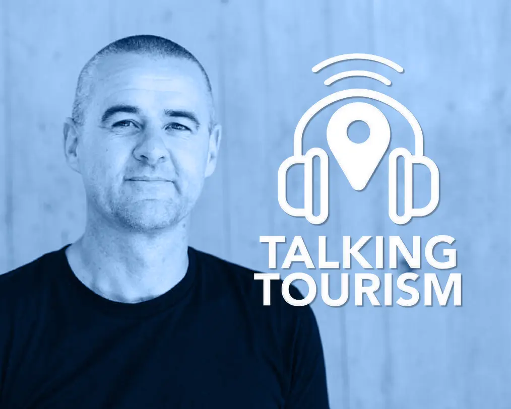 A portrait of Todd Henderson promoting the Talking Tourism Podcast