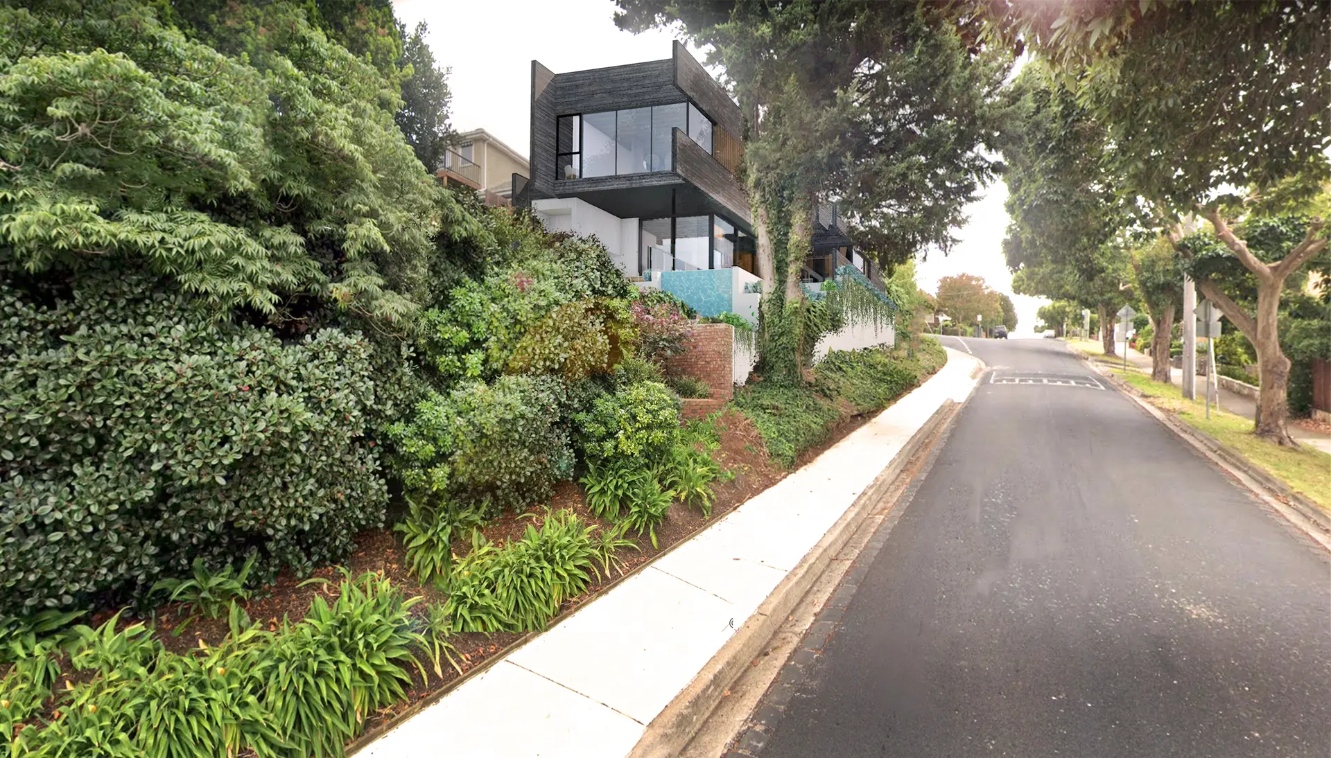 A rendered image of the new home from the side street.
