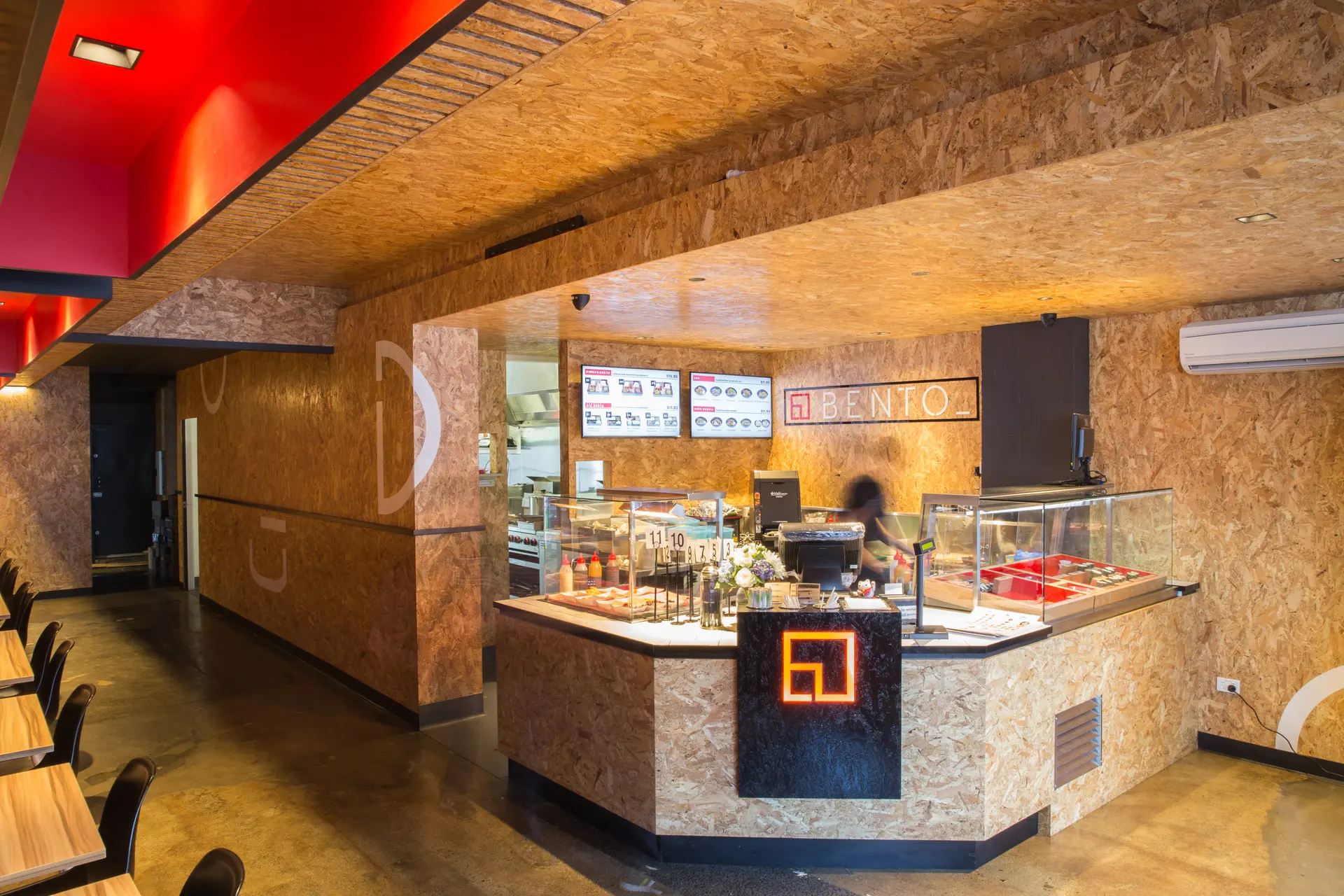 The serving counter and kitchen at Bento Moonah