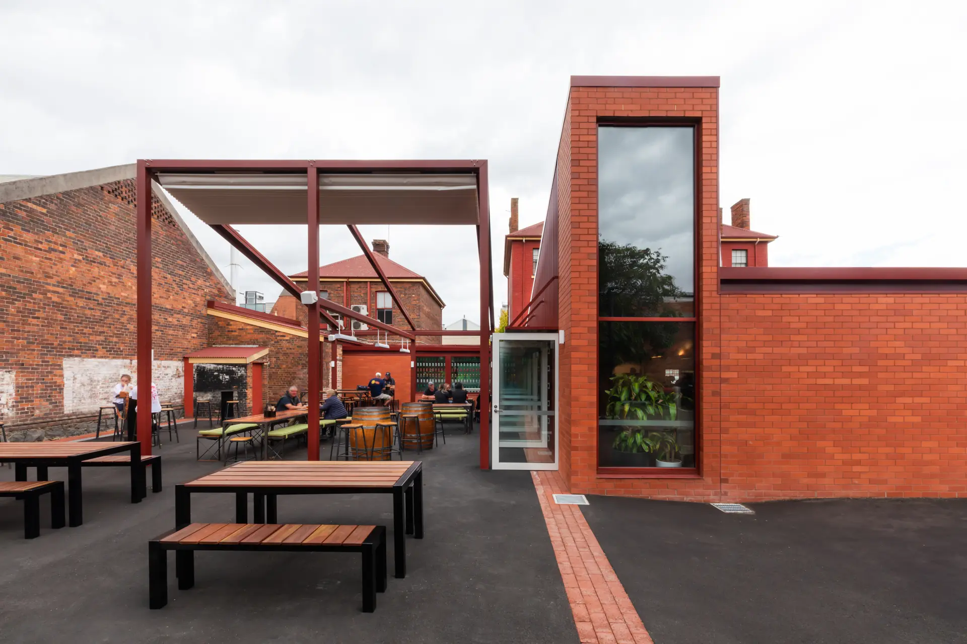 External view of the tall feature window alongside the beer garden.