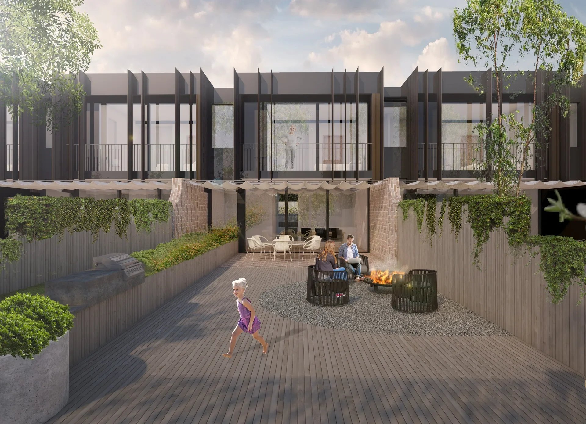 A private rear terrace is framed by brick and timber fencing, with a retractable awning extending over an outdoor dining area. Vertical metal fins above provide screening to upper-level balconies, while planting softens the edges of the courtyard and firepit seating area.