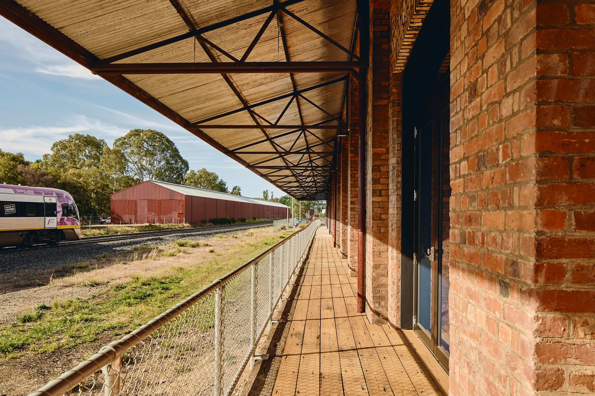 The Shed’s original internal timber flooring are repaired and adaptively reused for the flooring at the verandah – maintaining a strong connection to the existing building’s character.
