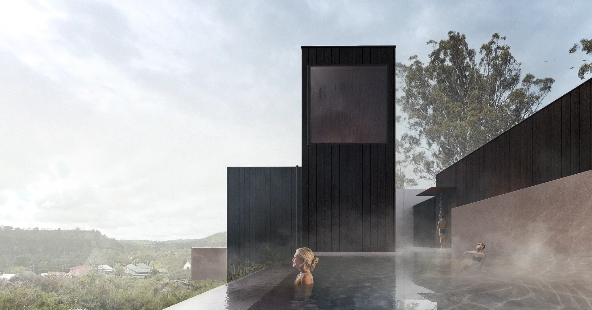 An infinity-edge outdoor hot pool extends toward the surrounding landscape, its waterline merging with distant views. Tall, vertically clad timber volumes behind contain the sauna and steam room, while a solid wall to the right conceals reception, private bathrooms, and lockers leading through to the indoor hot pool.