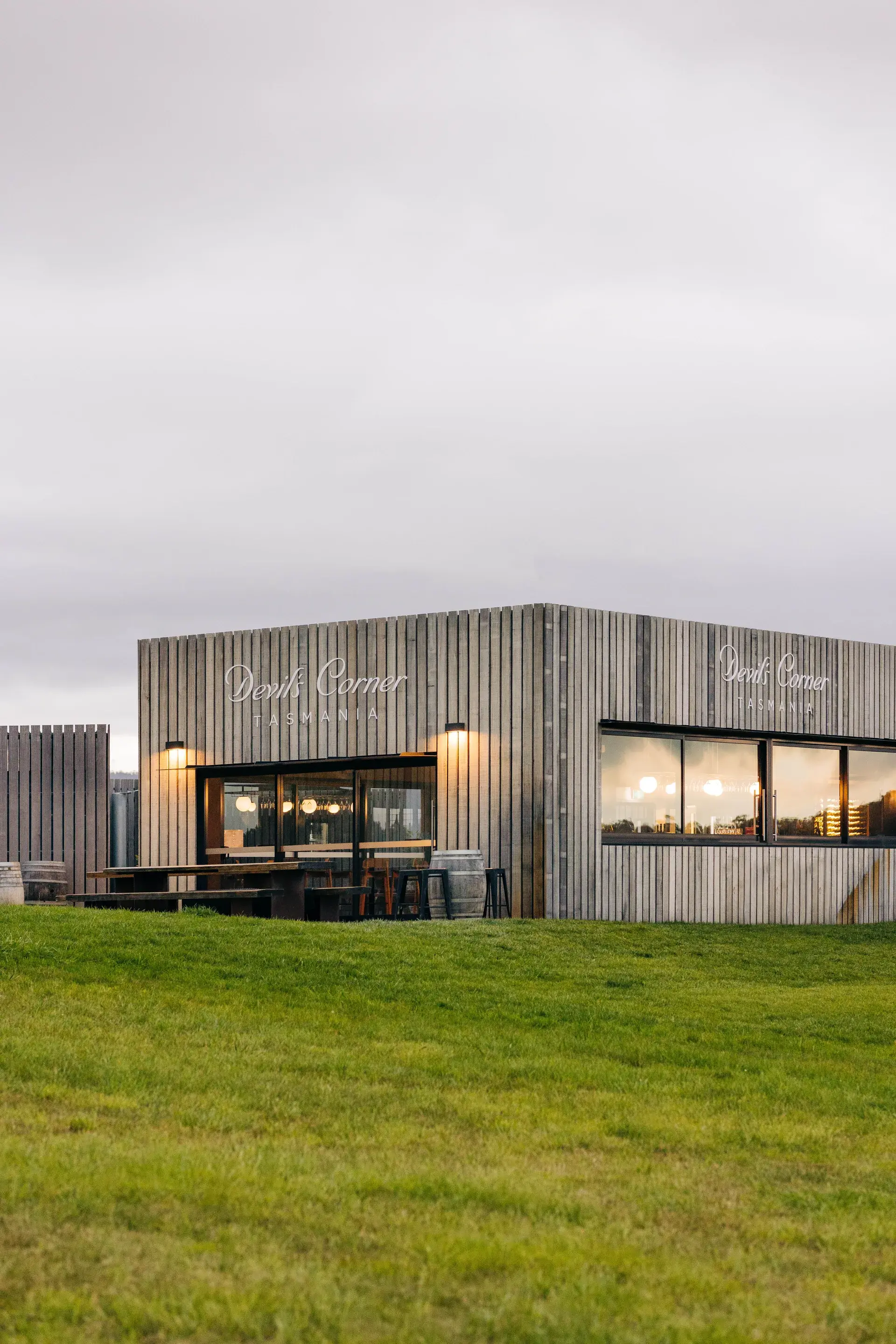 The vertical timber cladding of the extension.