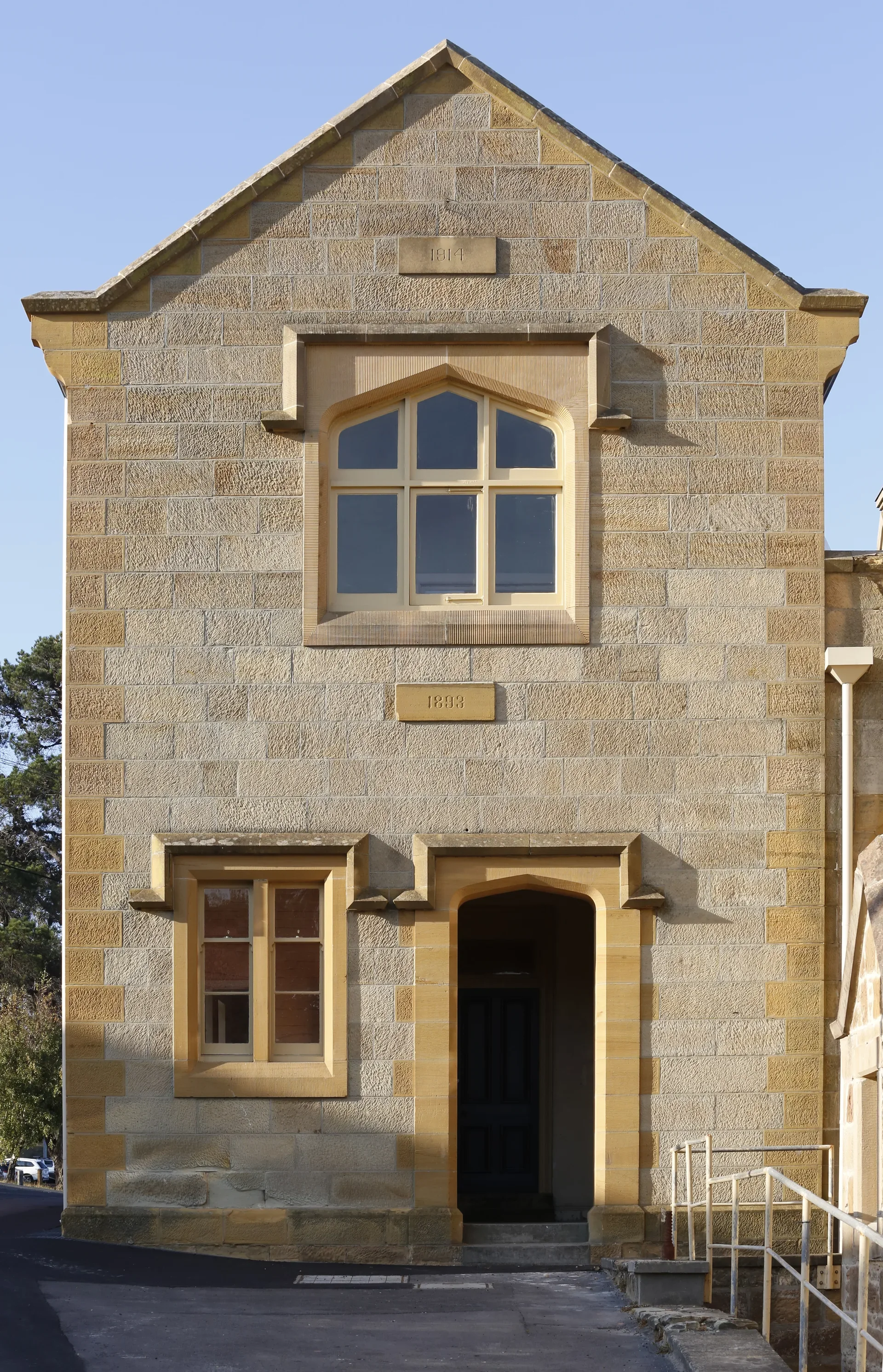 One of the more modest wings of the sandstone building.