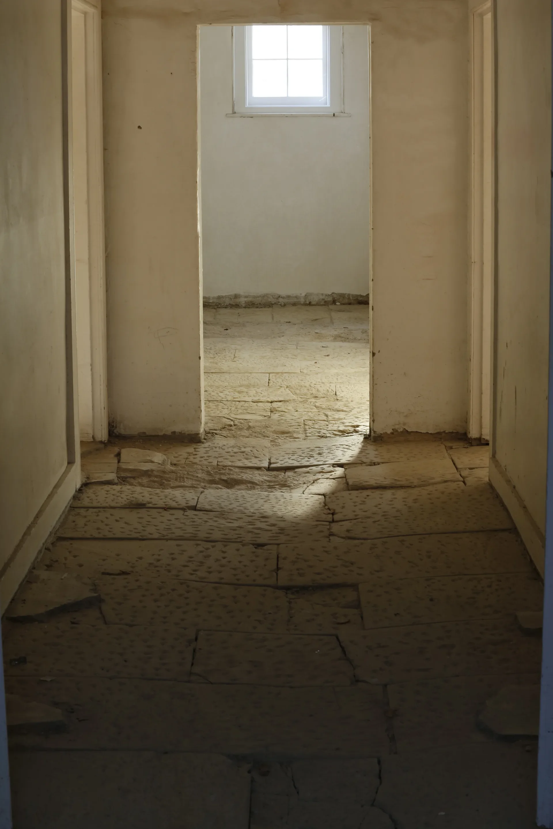 A detail of the worn flagstones in the lower levels.