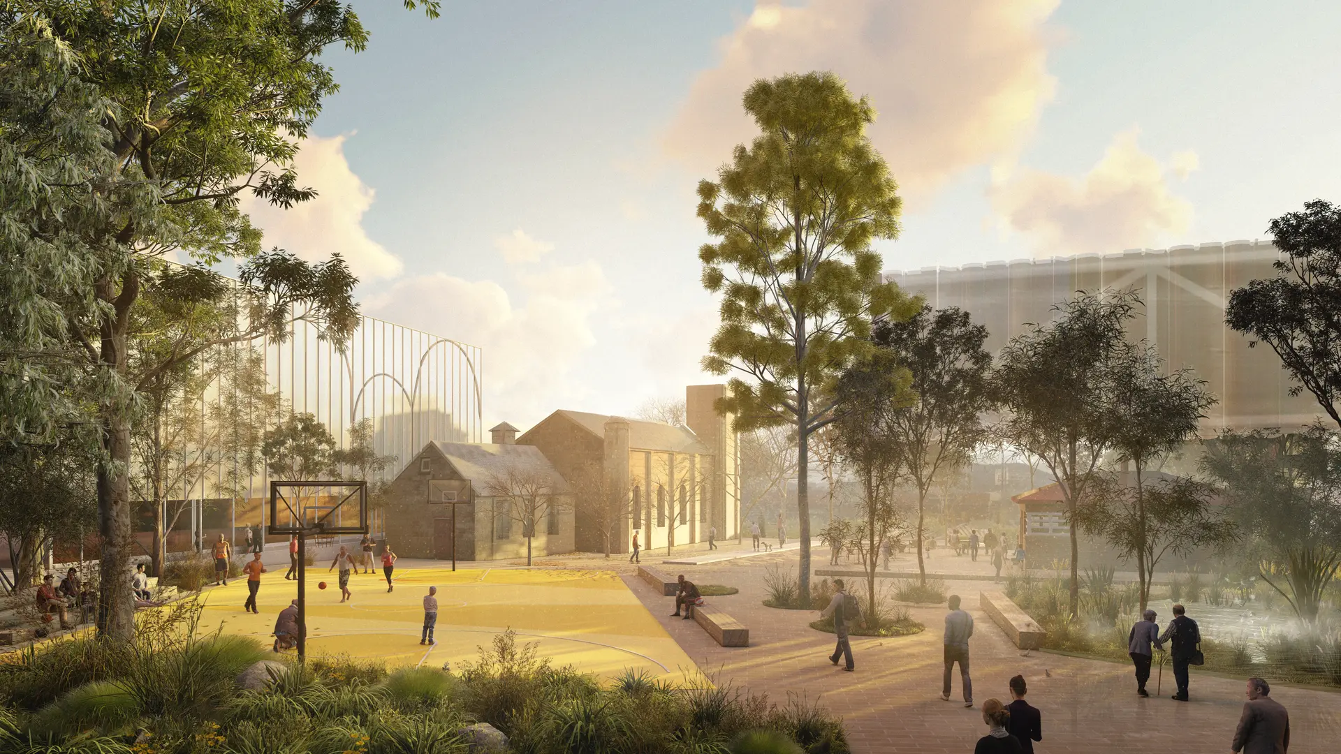 An elevated visualisation of the master plan looks in the opposite direction of the basketball court, towards the existing St Matthews Church. Mature gumtrees frame the scene, with wet landcaped zones illustrating native planting beneath the cantilevered polycarbonate-clad extension of the new library.