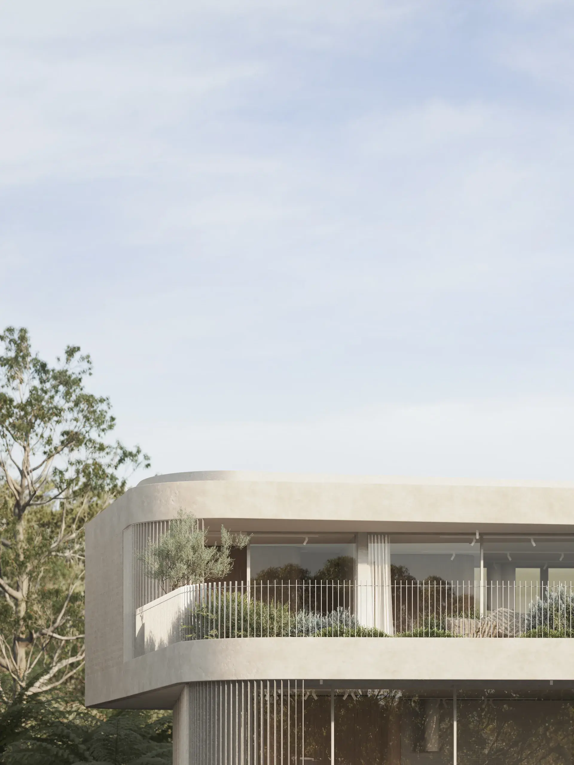 A cropped exterior render of the upper level, showing continuous curved balconies with vertical metal screening and integrated planter beds. The restrained material palette of pale concrete and soft greenery sits lightly against the surrounding tree canopy.