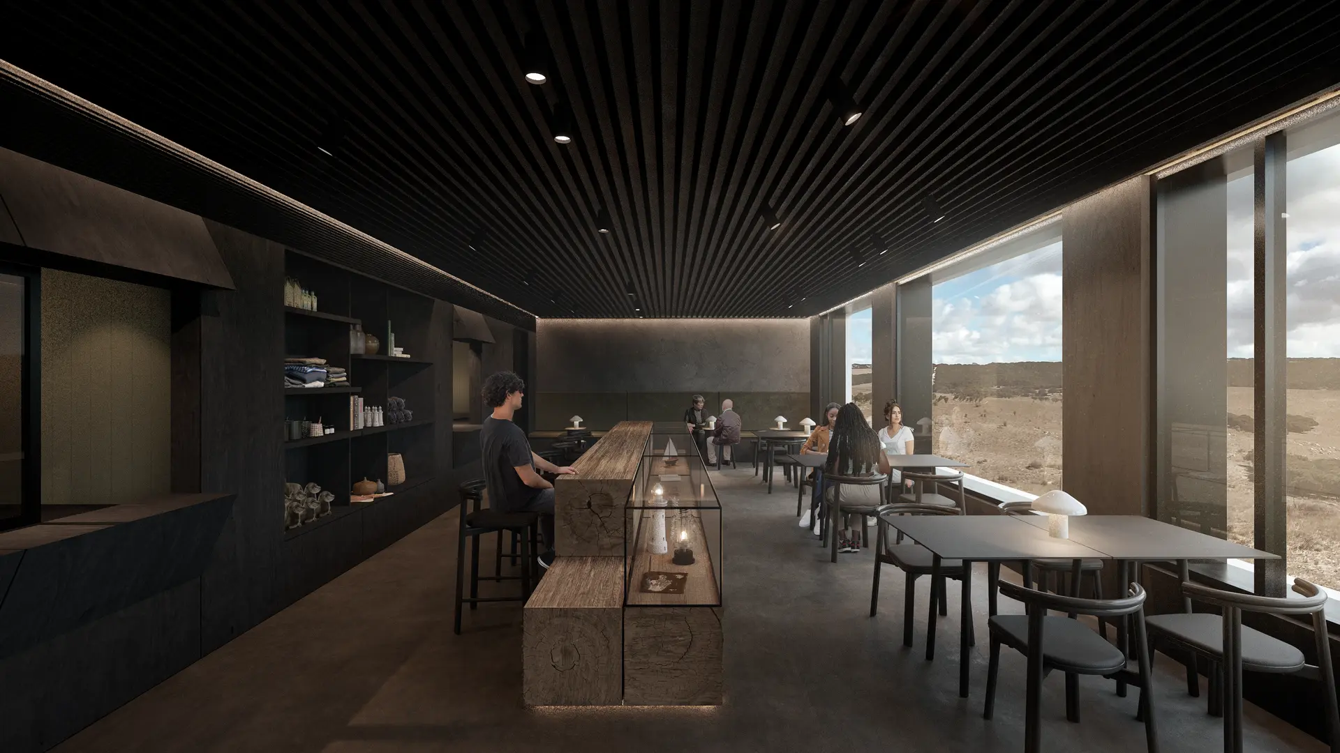 The interior dining space is defined by a dark, restrained palette, with a black slatted ceiling and integrated linear lighting creating a calm, intimate atmosphere. A long, monolithic timber bench runs through the centre, with glass joinery attached containing local artefacts in a museum-like display. Paired with Design Nation Fable Tables and Design By Them Twill Chairs positioned along full-height glazing overlooking the coastal terrain, Cult Pao Still Table Lamps softly illuminate each setting, while Design Nation Connect Low Stools and Design By Them Pillar Side Tables complement the material palette throughout.