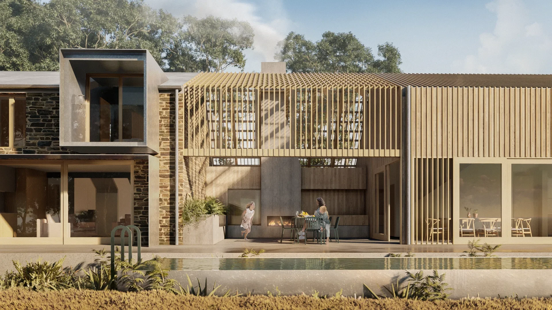 A timber-slat longhouse featuring a striking outdoor fireplace and a reflecting pool in the foreground. A family is enjoying the patio, which blends natural stone walls with contemporary wood screens against a lush forest backdrop.