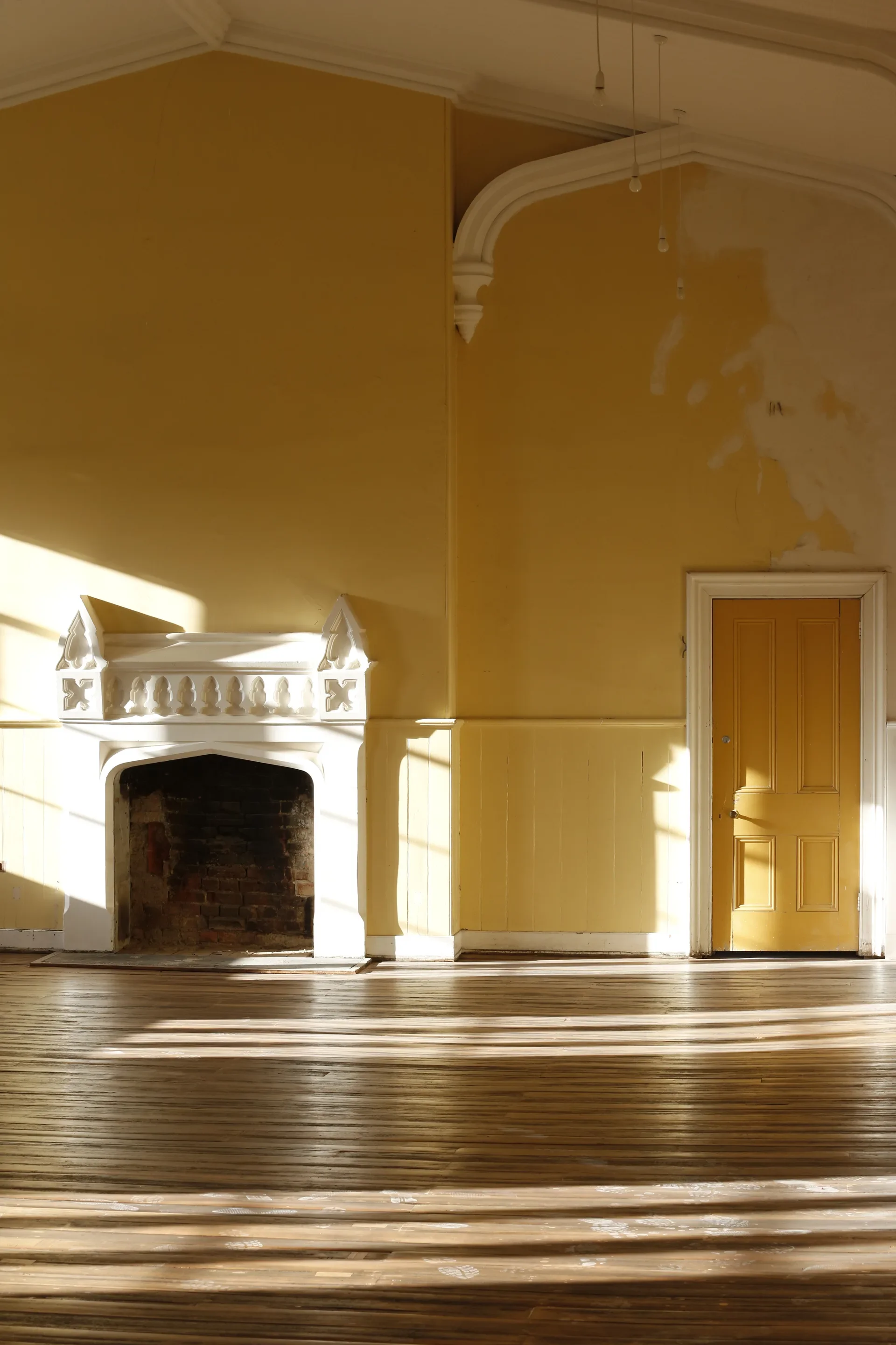 A decorative fireplace in one of the main halls.