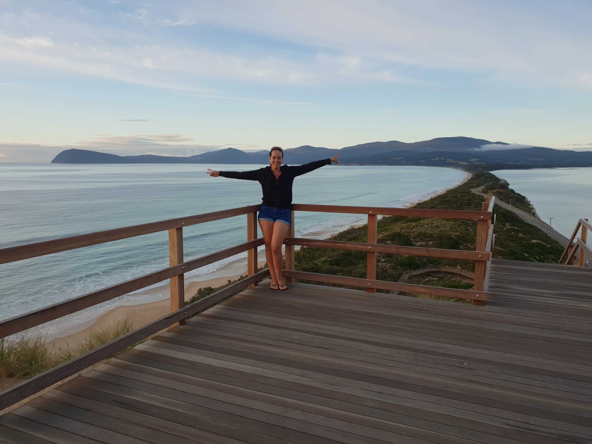 Sunrise at "The Neck/Truganini Lookout" on Bruny Island, Tasmania: standing at the top of a scenic outpost with sweeping views of Simpsons Bay on one side and Neck Beach on the other.
